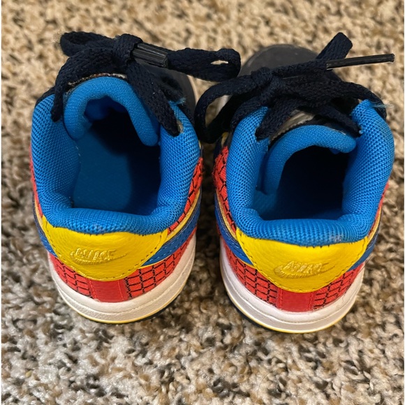 Nike infant shoes size 4C with blue swoosh and yellow trim, and red and black. - Picture 4 of 4